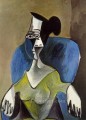 Mujer sentada en un sillón azul 1962 cubista Pablo Picasso